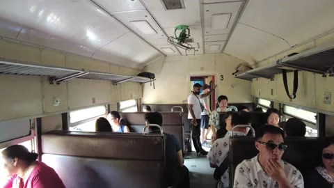 Passengers in the train from Demodara to Ella Stock Footage 315337001