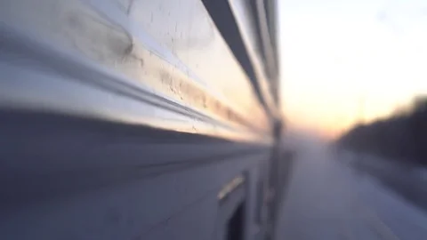Passengers train winter fast speed snow 4k Siberia View from the side Stock-Footage 74503190