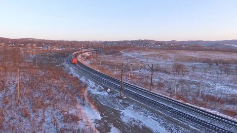 Passengers train winter fast speed. Snow aerial 4K Fast panorama Video stock 74503272