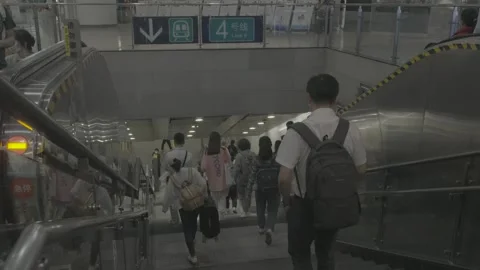 Passengers Use Line 4 Transfer Escalator in Beijing Subway Видео 341456920