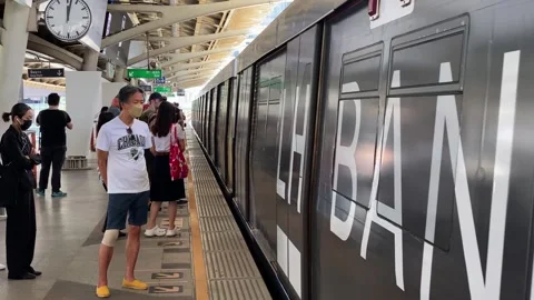 Passengers use the Skytrain transport system, Bangkok, Thailand 4K Video stock 281404136