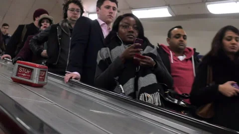 Passengers Using Escalator In The London Underground HD Stock Footage 131171726