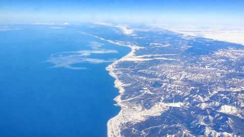 The passenger's view through the plane window during the flight. Stock Footage 126932368