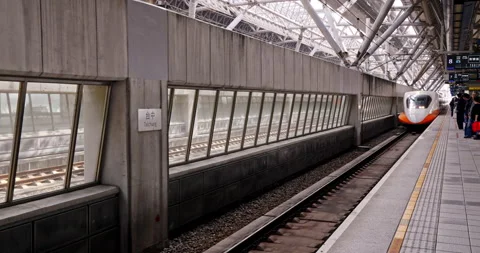 Passengers wait on the platform for the high-speed rail train to arrive. Stock Footage 331051662
