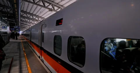 Passengers wait on the platform for the high-speed rail train to arrive. Stock Footage 331052275
