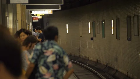 Passengers Wait on Subway Platform - Osaka, Japan Stock Footage 96005417