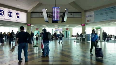 Passengers wait for their flights in Panama City intl. airport, Panama, 4K Stock Footage 147754739