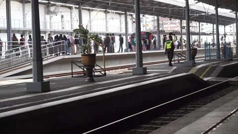 Passengers wait for the train Stock Footage 297419171
