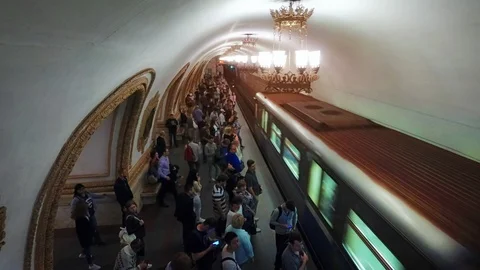 Passengers Wait for a Train in this Ornate Subway Station in Kiev Stock Footage 97244507