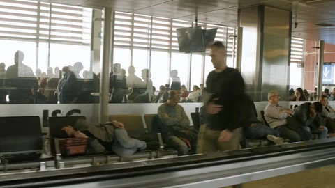 Passengers waiting and going to Gate at Airport. Automatic Track use. Stock Footage 89413785