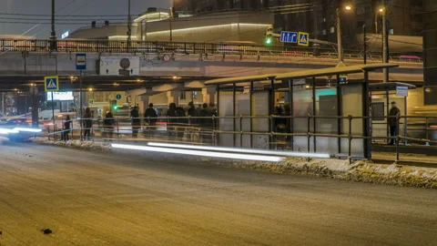 Passengers waiting and taking the tram at a busy stop, time lapse Stock Footage 100452182