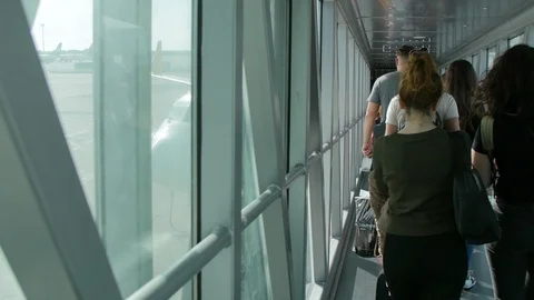 Passengers waiting to board the Airplane in the Docking Sleeve Video stock 89608360