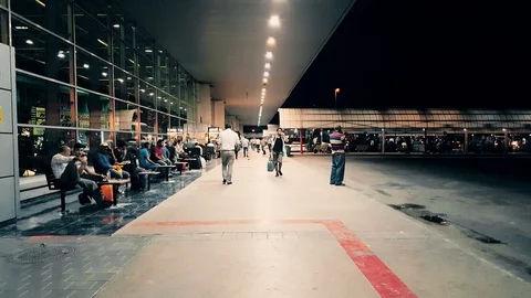 Passengers waiting the bus at Bursa Bus Terminal at night Stock Footage 104490982