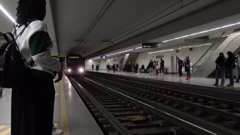Passengers waiting for light rail train Stock Footage 293739533