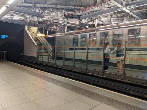 Passengers waiting on the platform of the Hillhead underground station in Stock Photos