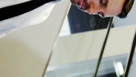 Passengers waiting in queue at a check-in counter Stock Footage 300428463