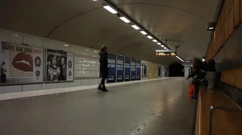 Passengers waiting for a subway train Stock Footage 10702523