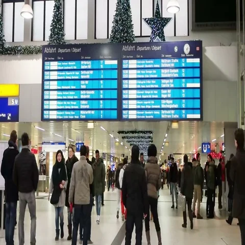 Passengers waiting for a train at the station Stock Footage 69550090