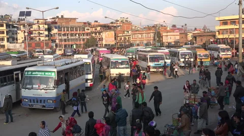 Passengers walk across the main bus station in Kathmandu, Nepal Vídeo Stock 48784595
