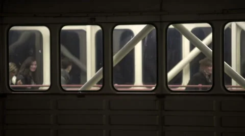Passengers walk inside a disembarkment bridge Видео 42854032