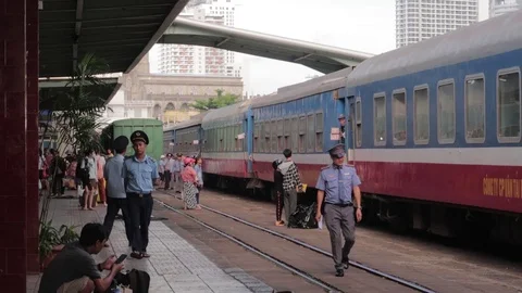 Passengers walk on the platform of the railway station in Vietnam, Stock Footage 118283142