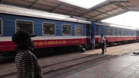 Passengers walk on the platform of the railway station in Vietnam, 스톡 동영상 118283310
