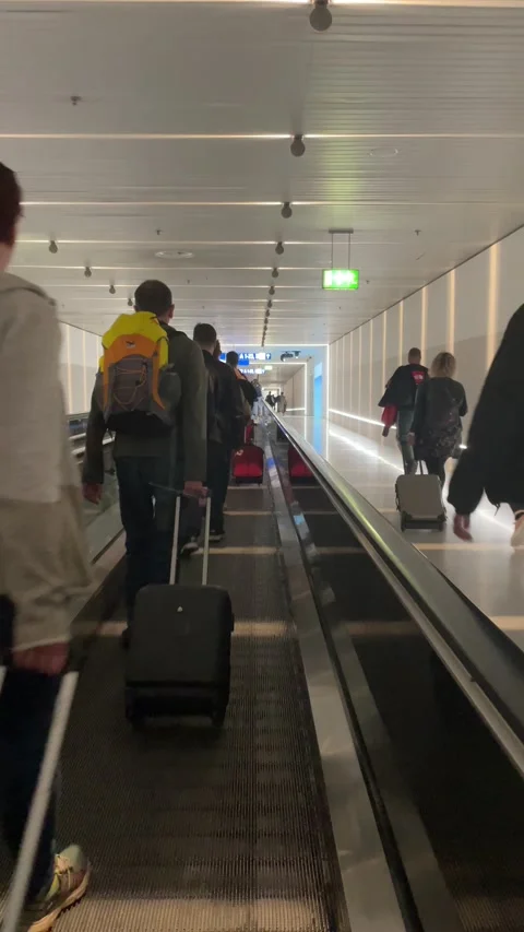 Passengers walking at the airport. 스톡 동영상 219413557