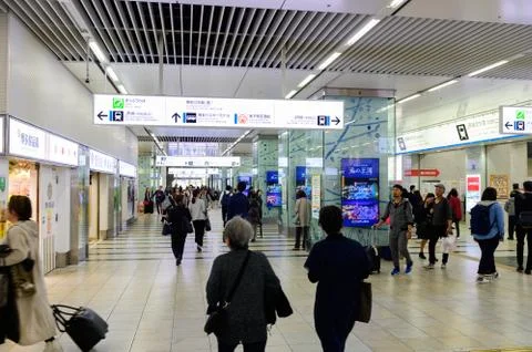 Passengers walking inside of Hakata train station, Fukuoka Stock Photos