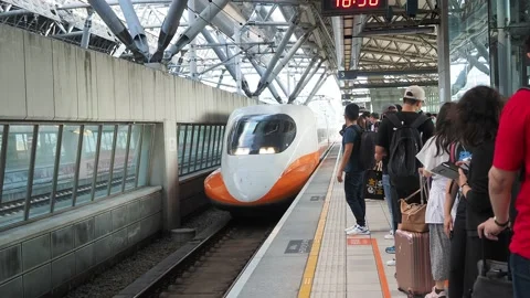 Passengers wearing face mask in platform of high speed rail Stock Footage 136613856