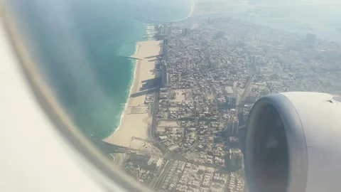 Passengers window Aerial point of view Abu Dhabis sunlit sandy beach coastl.. Stock Footage 308500154