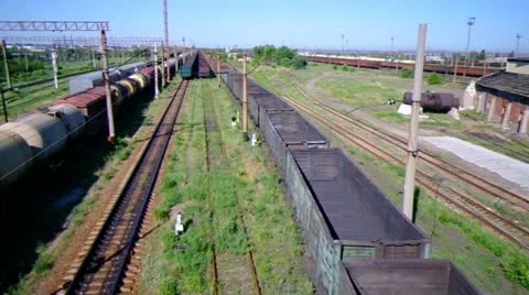 Passes an empty railroad train, a topside view. Stock Footage 11858514