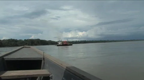 Passing a barge on the Napo River, Amazon Stock Footage 296653
