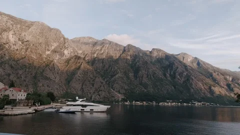 Passing by a bay with a speed bout. Stock Footage 129749037