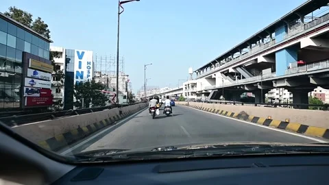Passing by Begumpet Metro Train Station in Hyderabad city Stock Footage 149177520