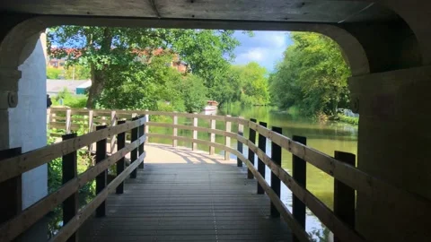 Passing below bridge at Odense River Video stock 140674997