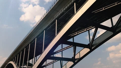 Passing Below a huge Arc Iron Bridge Видео 122377273