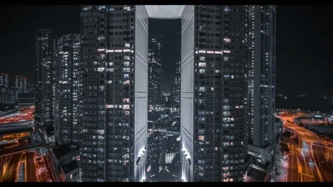 Passing between two sections of a building aerial Stock Footage 218273345