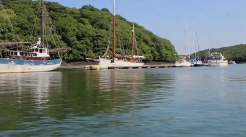 Passing boats moored up Stock Footage 39936213