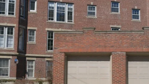 Passing Brick Building Apartment Complex in Boston Stock Footage 92184140