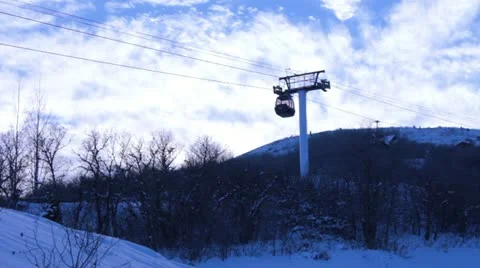 Passing cable cars with white clouds Video stock 20455828
