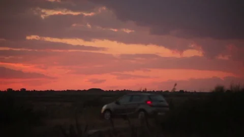 Passing cars at  dramatic  sky Vídeo Stock 74204512