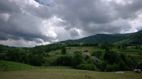 Passing Clouds Cast Shadows On Snow Capped carpathian mountains time lapse Stock-Footage 88887452