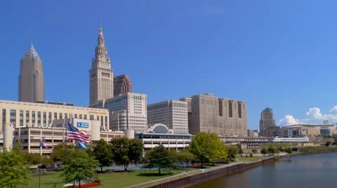 Passing downtown Cleveland skyline from Cuyahoga river Stock Footage