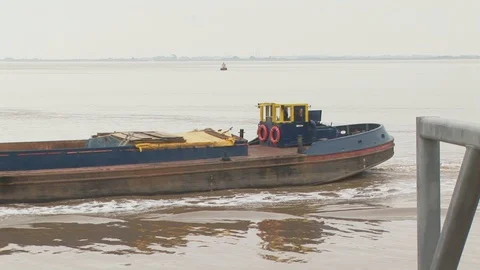 Passing empty cargo barge on the River Hull, Kingston Upon Hull, England Stock Footage 106097748