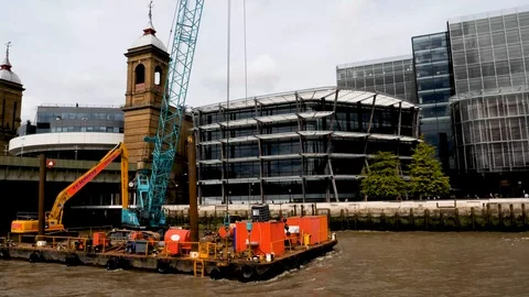 Passing floating construction barge on the Thames River at London Stock Footage 95335002