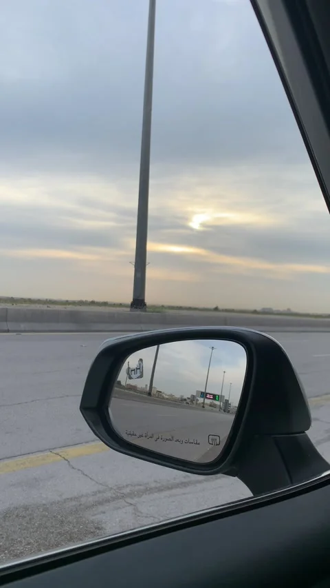 Passing Highway Traffic from Side View Mirror Stock Footage 238716875