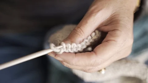 Passing Large Needle Through Loops Stock Footage 120313162