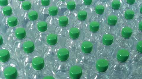 Passing Many Water Bottles On Table Stock Footage 134912765