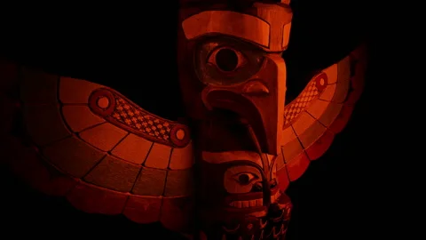 Passing A Native American Totem Pole In Fire Glow Stock Footage 235390336