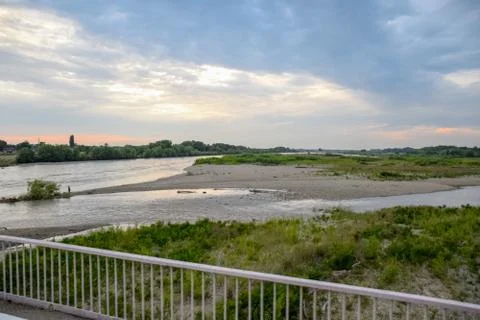 Passing over the bridge over river. The landscape of the river, the surface a Stock Photos